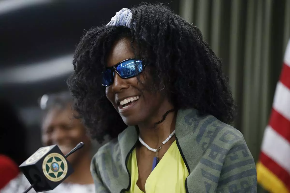 Tiffany Slaton, a hiker found in the High Sierra after going missing for three weeks, speaks during a press conference, Friday, May 16, 2025 in Fresno, Calif. (AP Photo/Gary Kazanjian)