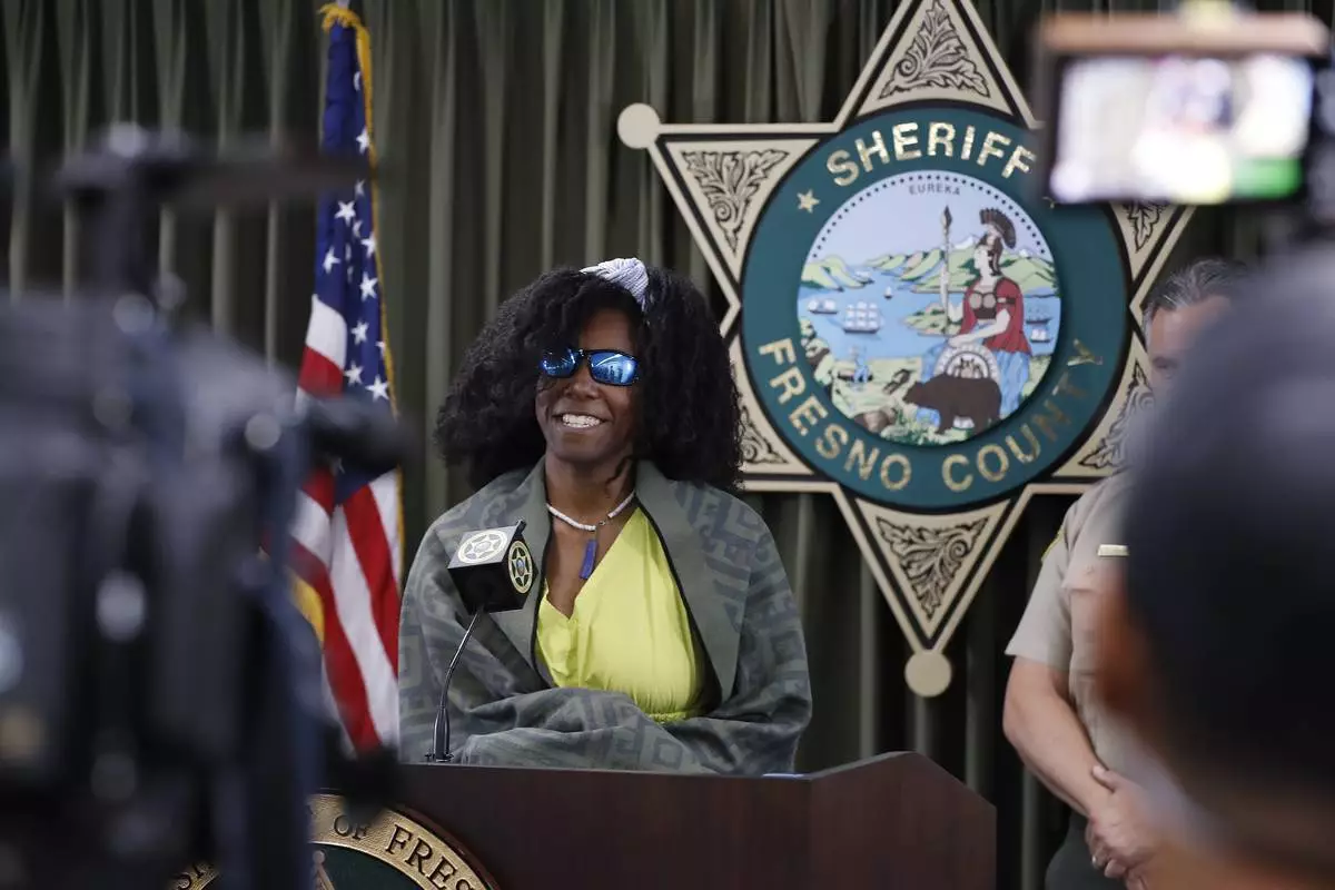Tiffany Slaton, a hiker found in the High Sierra after going missing for three weeks, speaks during a press conference, Friday, May 16, 2025 in Fresno, Calif. (AP Photo/Gary Kazanjian)