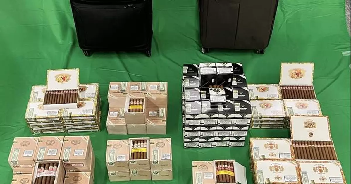 Two passengers sentenced to four months for smuggling $882,000 in duty-not-paid tobacco and smoking products.