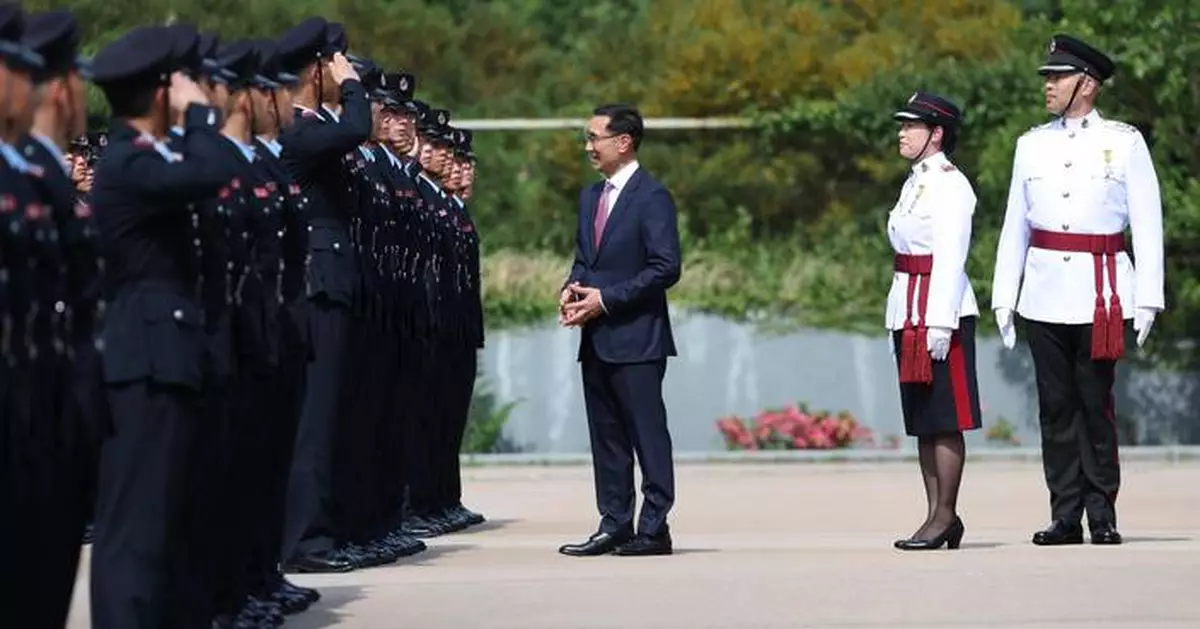 Hong Kong Jockey Club Chairman Reviews Fire Services Graduation Parade and Highlights Emergency Preparedness Initiatives.