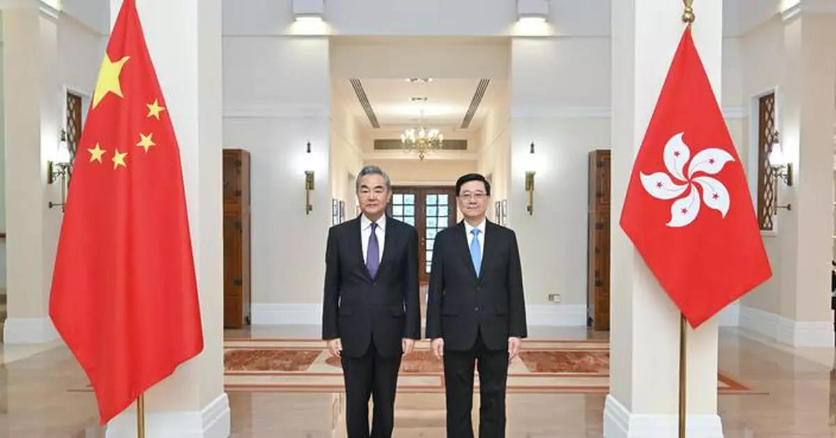 John Lee Welcomes Wang Yi for IOMed Signing Ceremony in Hong Kong