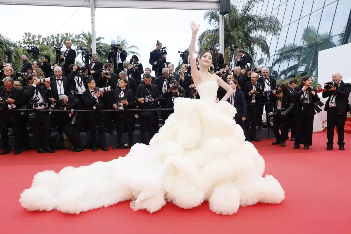 Wan QianHui poses for photographers during the opening ceremony red carpet of the 78th international film festival, Cannes, southern France, Tuesday, May 13, 2025. (Photo by Joel C Ryan/Invision/AP)