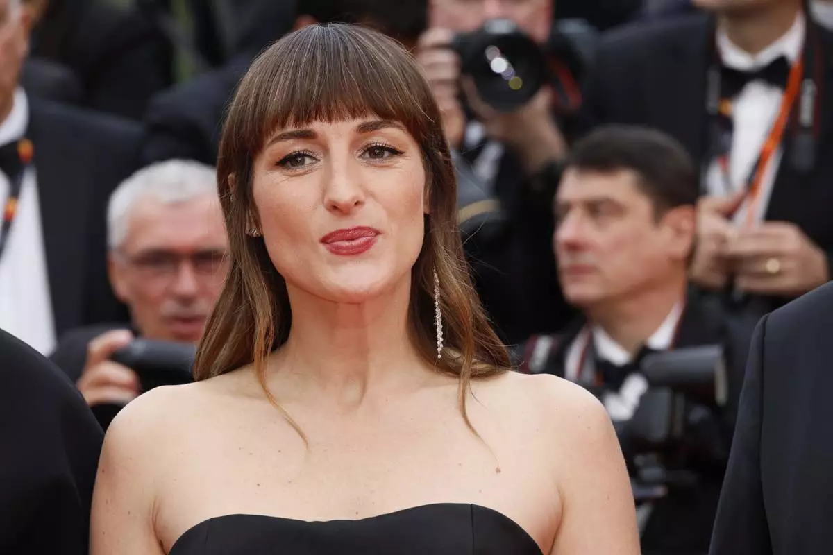Juliette Armanet poses for photographers during the opening ceremony red carpet of the 78th international film festival, Cannes, southern France, Tuesday, May 13, 2025. (Photo by Joel C Ryan/Invision/AP)