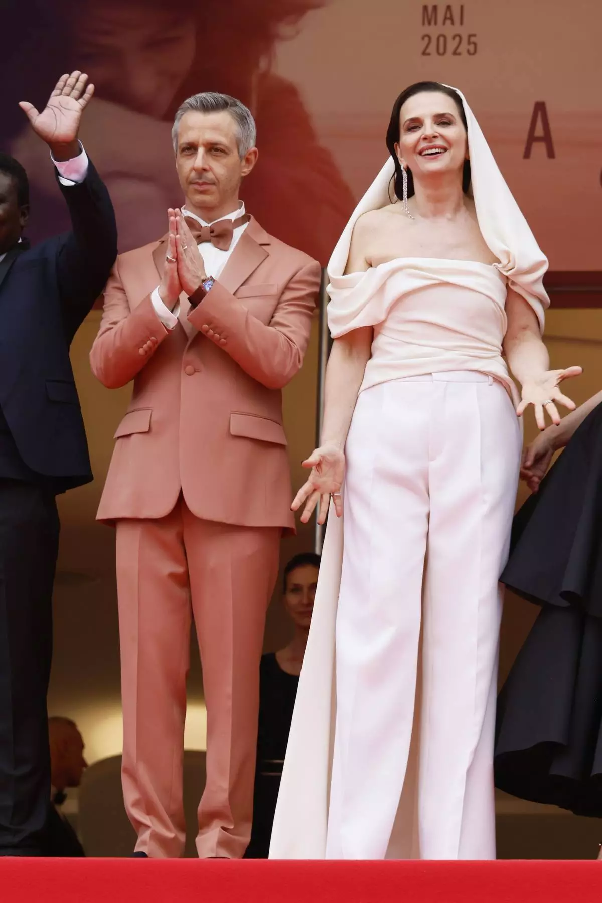 Jury member Jeremy Strong, left, and jury president Juliette Binoche pose for photographers during the opening ceremony red carpet of the 78th international film festival, Cannes, southern France, Tuesday, May 13, 2025. (Photo by Joel C Ryan/Invision/AP)