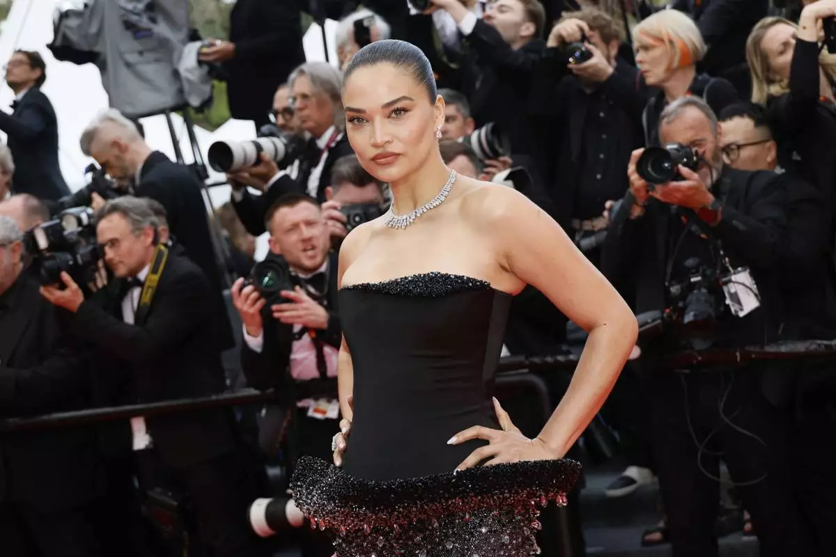 Shanina Shaik poses for photographers during the opening ceremony red carpet of the 78th international film festival, Cannes, southern France, Tuesday, May 13, 2025. (Photo by Joel C Ryan/Invision/AP)