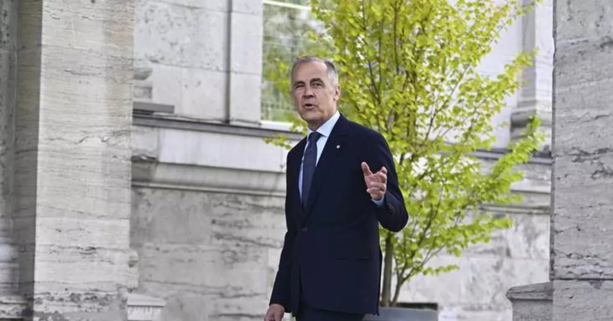 Canadian Prime Minister Carney names a new foreign minister in a Cabinet shake-up