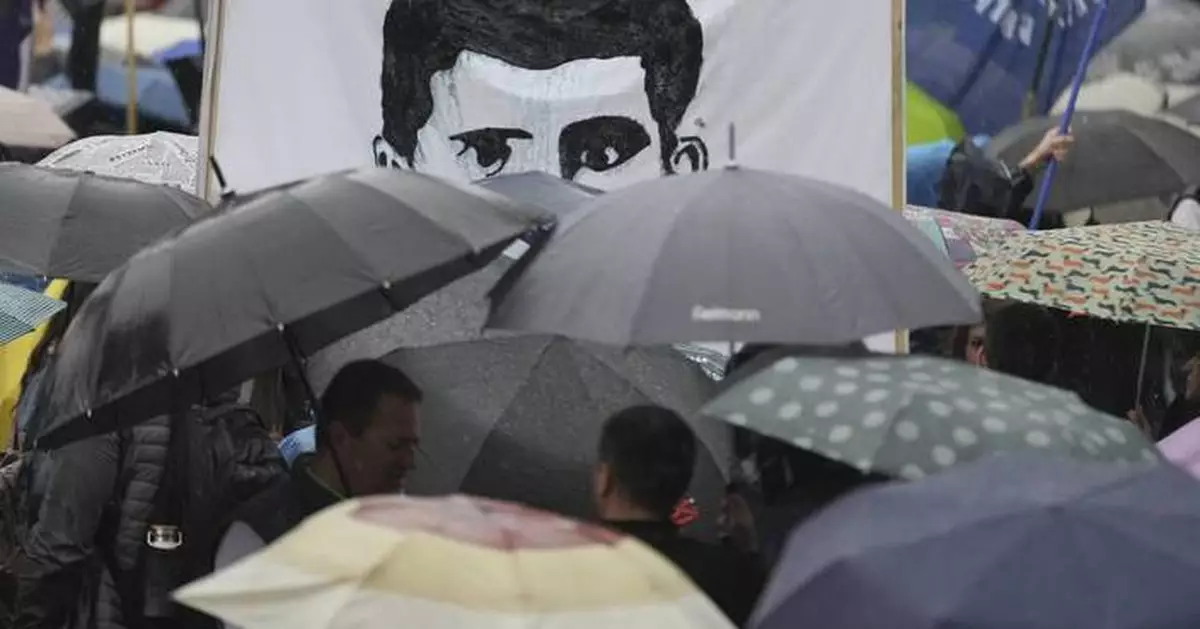 Thousands brave heavy rain to protest Serbia's crackdown on universities