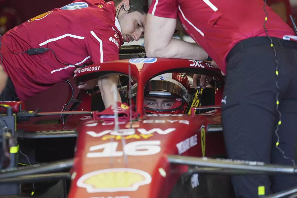 Ferrari driver Charles Leclerc of Monaco prepares for the first free practice at the Enzo and Dino Ferrari racetrack, ahead the Italy's Emilia Romagna Formula One Grand Prix, in Imola, Italy, Friday, May 16, 2025. (AP Photo/Antonio Calanni)
