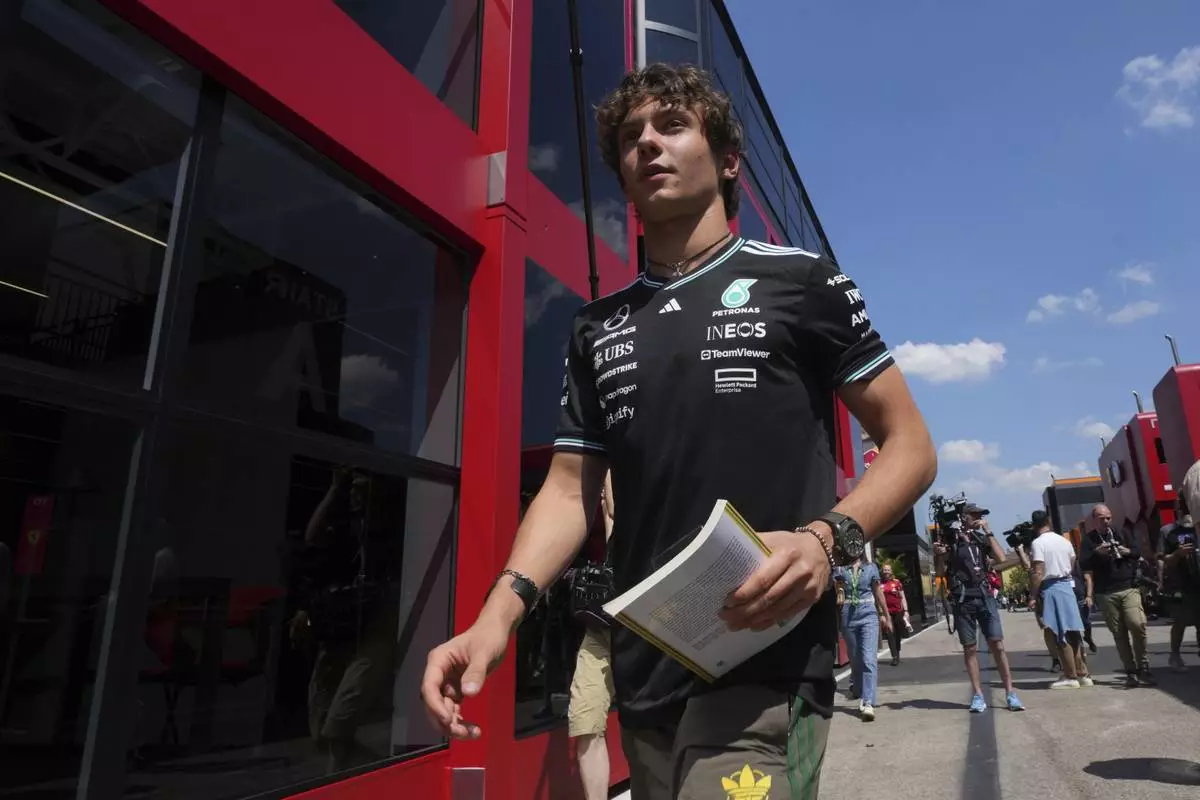 Mercedes driver Andrea Kimi Antonelli of Italy arrives for the first free practice at the Enzo and Dino Ferrari racetrack, ahead the Italy's Emilia Romagna Formula One Grand Prix, in Imola, Italy, Friday, May 16, 2025. (AP Photo/Antonio Calanni)