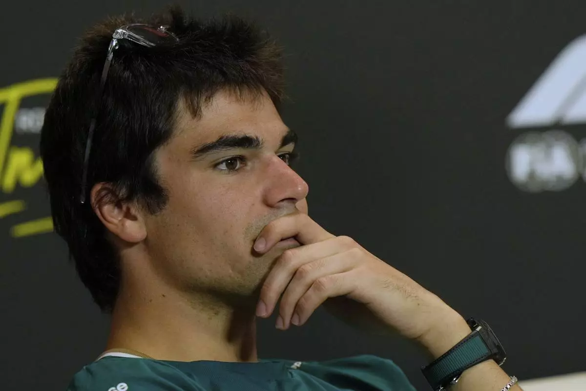 Aston Martin driver Lance Stroll of Canada answers reporters during a news conference at the Enzo and Dino Ferrari racetrack, ahead the Italy's Emilia Romagna Formula One Grand Prix in Imola, Italy, Thursday, May 15, 2025. (AP Photo/Luca Bruno)