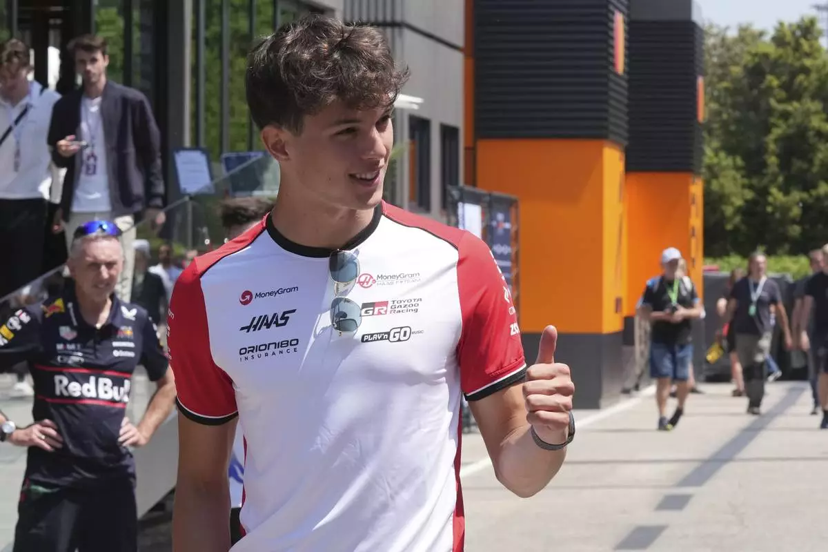 Haas driver Oliver Bearman of Britain arrives at the Dino and Enzo Ferrari racetrack, ahead the Italy's Emilia Romagna Formula One Grand Prix in Imola, Italy, Thursday, May 15, 2025. (AP Photo/Antonio Calanni)
