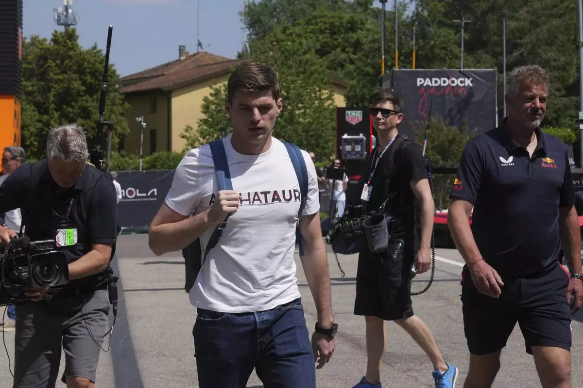 Red Bull driver Max Verstappen of the Netherlands arrives for the first free practice at the Enzo and Dino Ferrari racetrack, ahead the Italy's Emilia Romagna Formula One Grand Prix, in Imola, Italy, Friday, May 16, 2025. (AP Photo/Antonio Calanni)