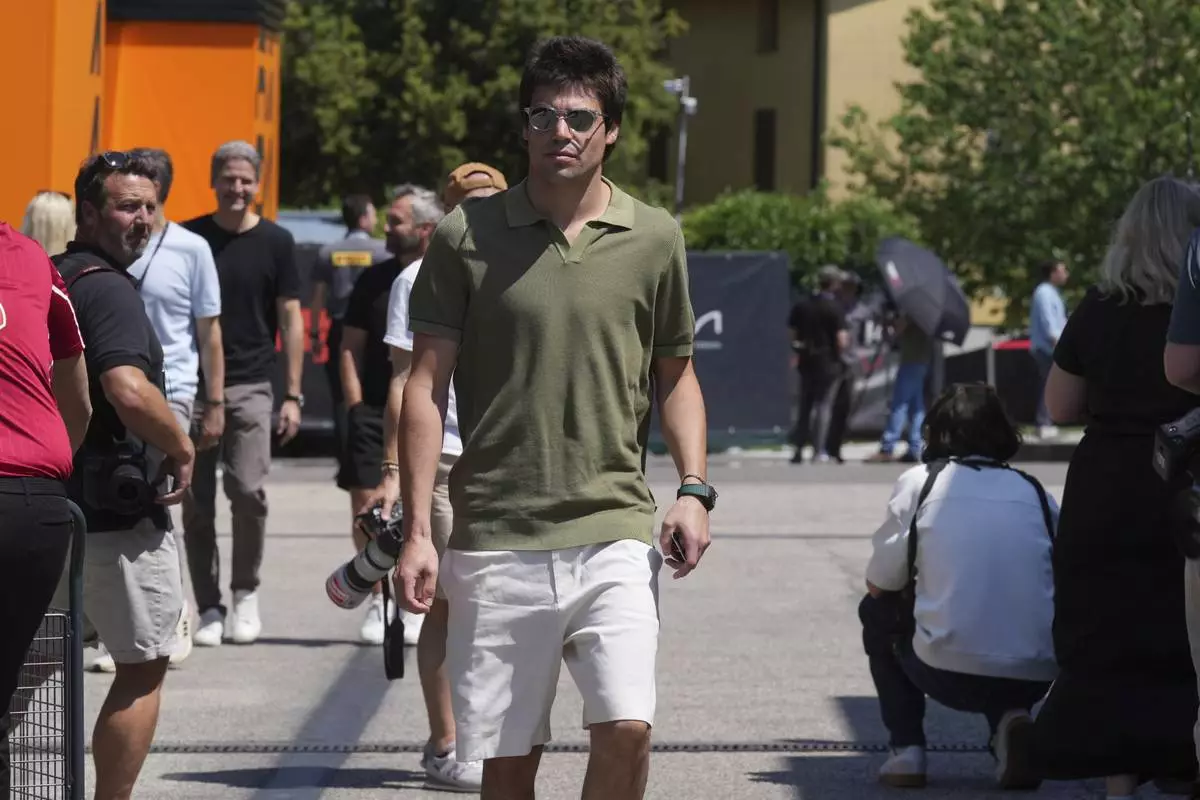 Aston Martin driver Lance Stroll of Canada arrives at the Dino and Enzo Ferrari racetrack, ahead the Italy's Emilia Romagna Formula One Grand Prix in Imola, Italy, Thursday, May 15, 2025. (AP Photo/Antonio Calanni)