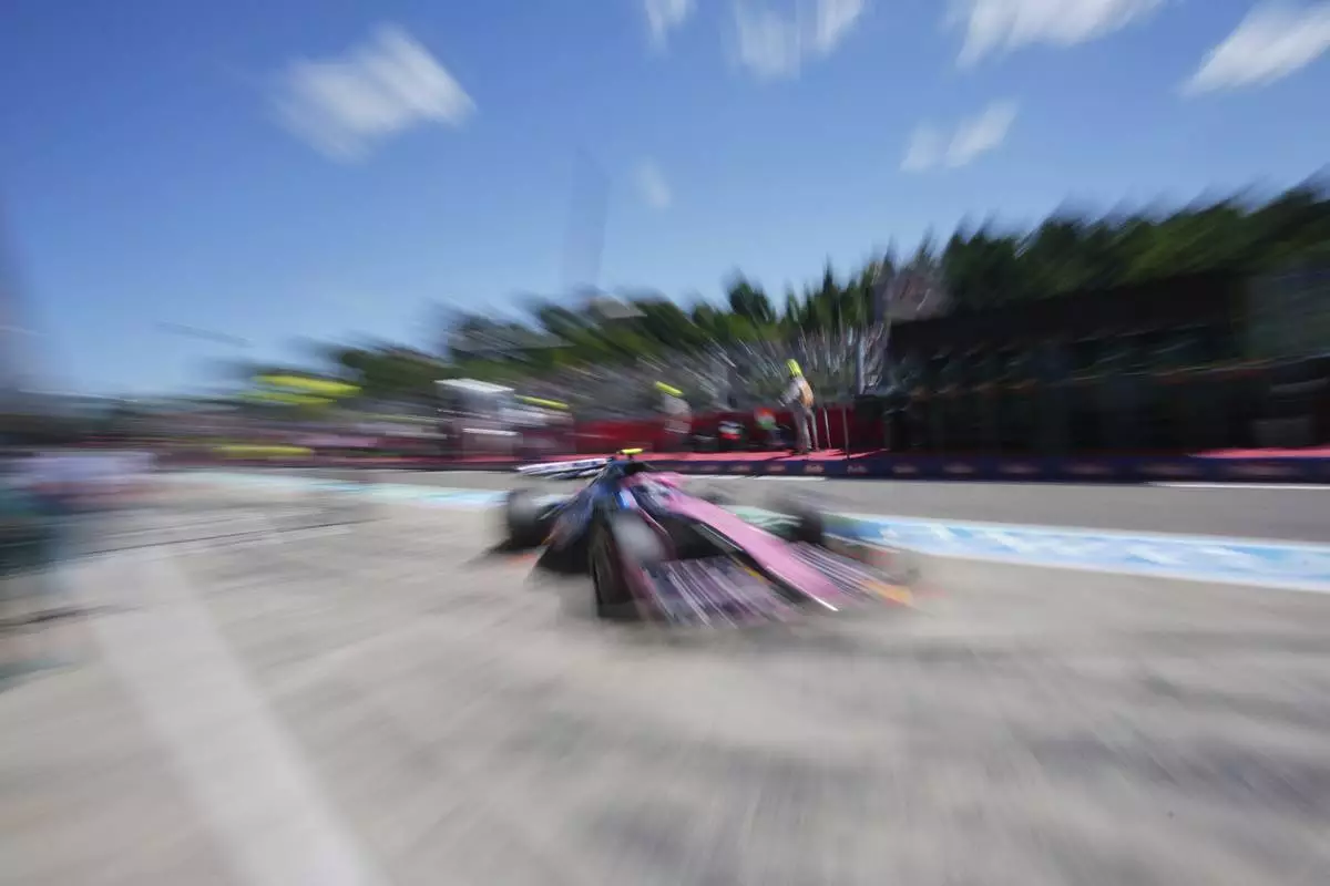 Alpine driver Franco Colapinto of Argentina enters the pitlane during the first free practice at the Enzo and Dino Ferrari racetrack, ahead the Italy's Emilia Romagna Formula One Grand Prix, in Imola, Italy, Friday, May 16, 2025. (AP Photo/Antonio Calanni)