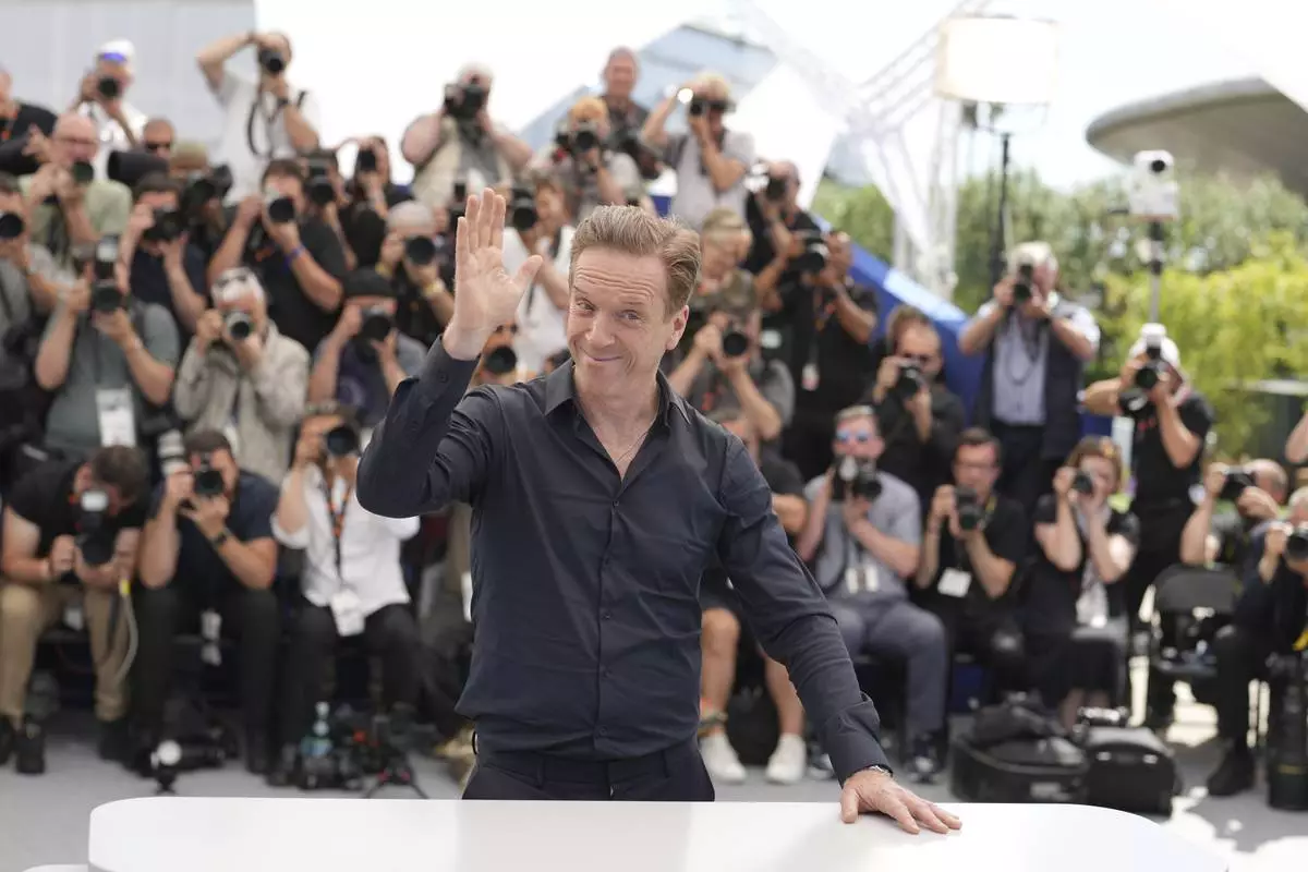 Damian Lewis poses for photographers at the photo call for the film 'Orwell: 2+2 = 5' at the 78th international film festival, Cannes, southern France, Sunday, May 18, 2025. (AP Photo/Natacha Pisarenko)