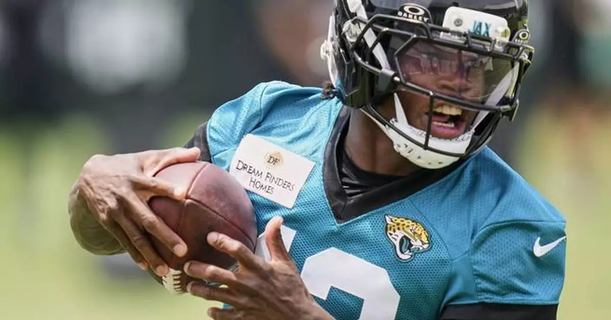 Jaguars' Travis Hunter will move to defense after wowing fans on offense during rookie camp