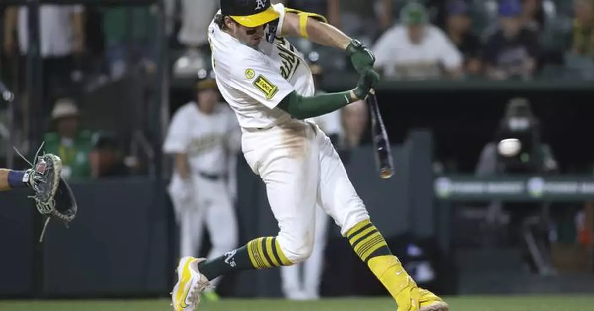 Wilson comes up clutch again as Athletics edge Mariners 7-6 in 11 innings