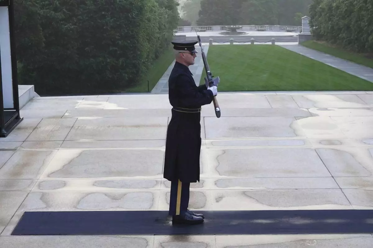 Army Sgt. 1st Class Andrew Jay patrols the Tomb of the Unknown Soldier, Thursday, May 15, 2025, at Arlington National Cemetery in Arlington, Va. (AP Photo/Mike Pesoli)