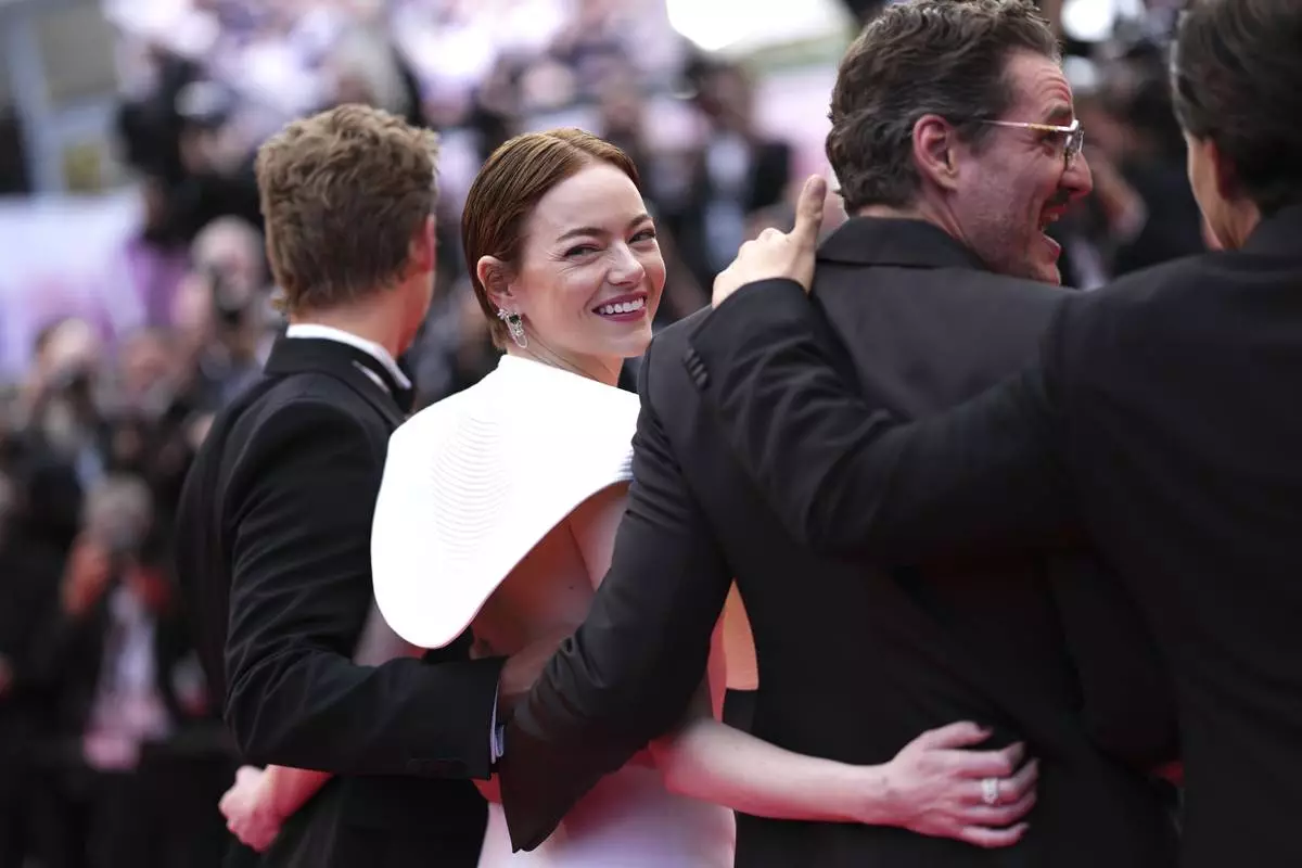 Austin Butler, from left, Emma Stone, Pedro Pascal and Clifton Collins Jr. poses for photographers upon arrival at the premiere of the film 'Eddington' at the 78th international film festival, Cannes, southern France, Friday, May 16, 2025. (Photo by Scott A Garfitt/Invision/AP)