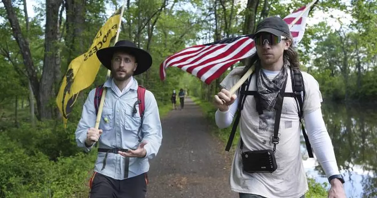 Quakers march against Trump’s crackdown on immigrants carrying on their long faith tradition