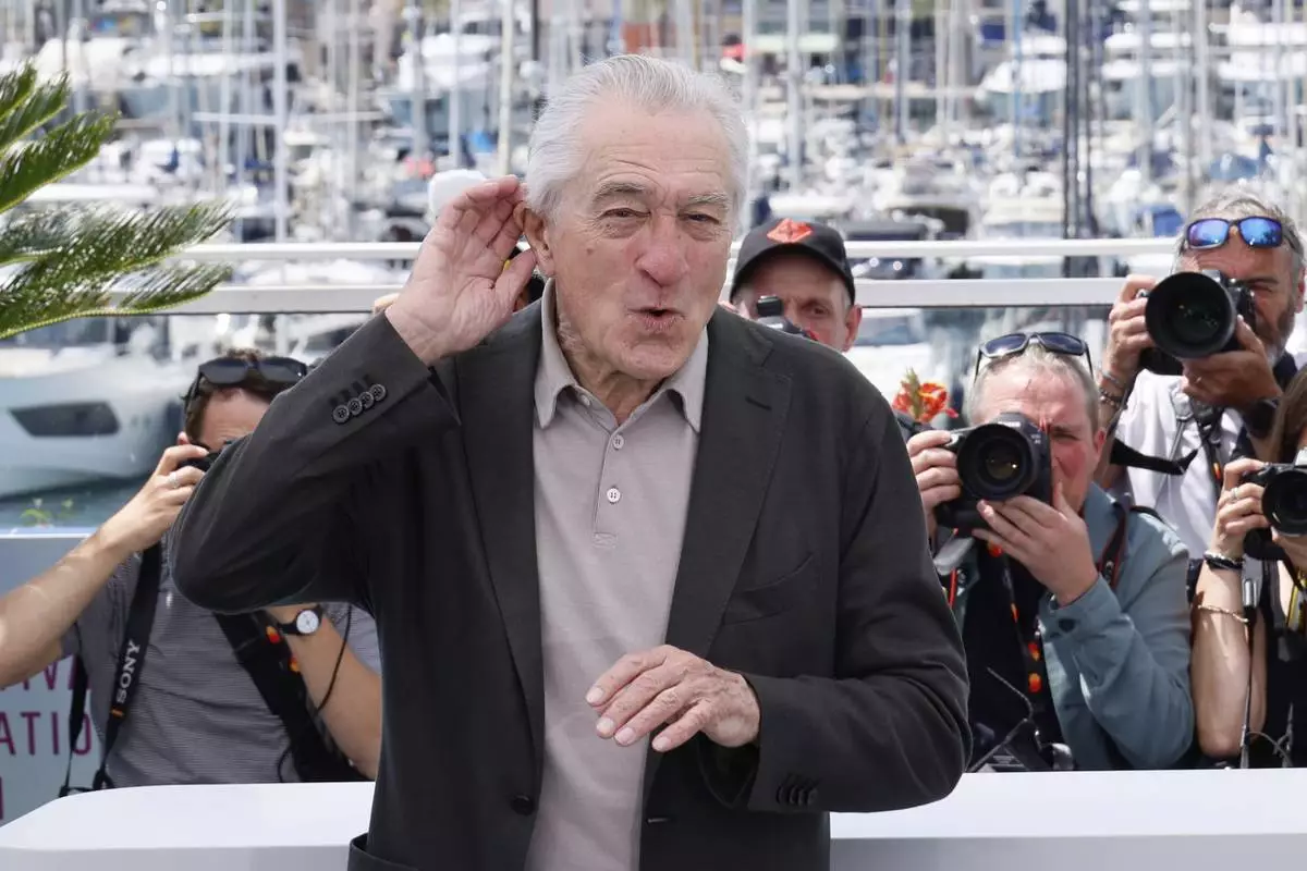 Honorary Palme d'Or recipient Robert De Niro poses for photographers during a photo call at the 78th international film festival, Cannes, southern France, Tuesday, May 13, 2025. (Photo by Joel C Ryan/Invision/AP)