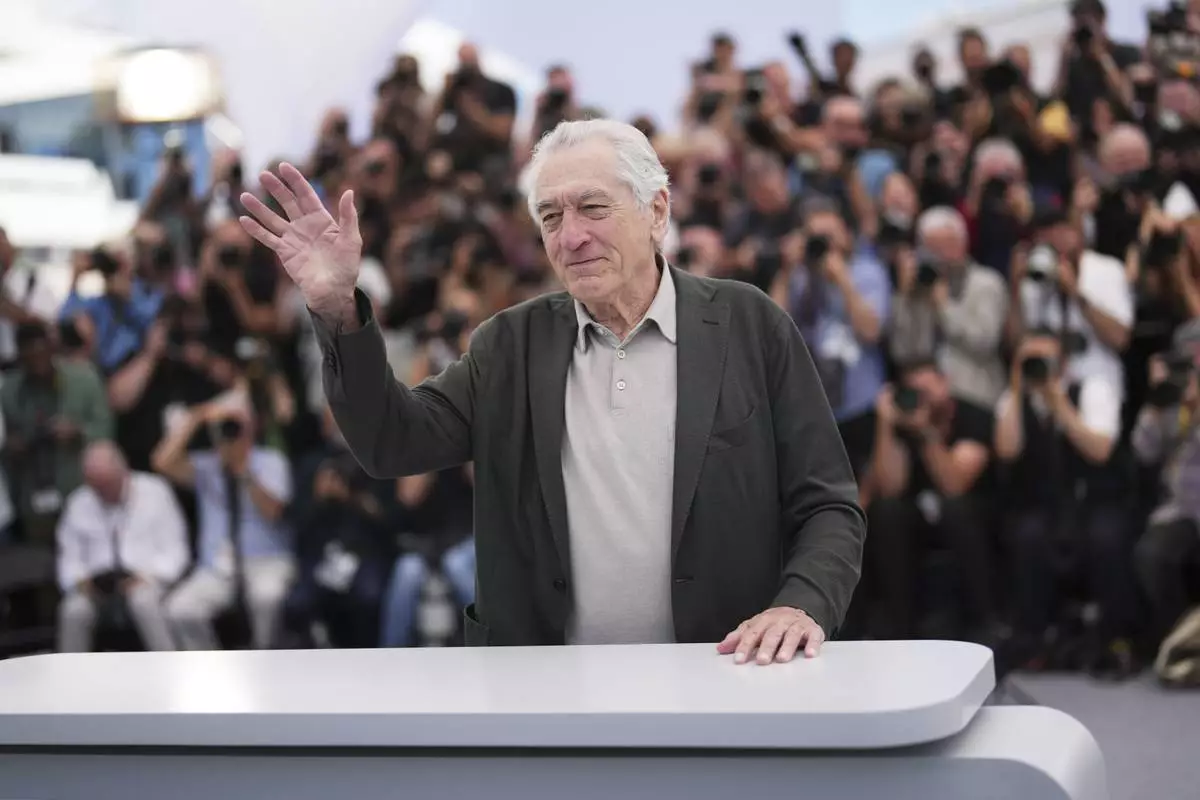 Honorary Palme d'Or recipient Robert De Niro poses for photographers during a photo call at the 78th international film festival, Cannes, southern France, Tuesday, May 13, 2025. (Photo by Lewis Joly/Invision/AP)