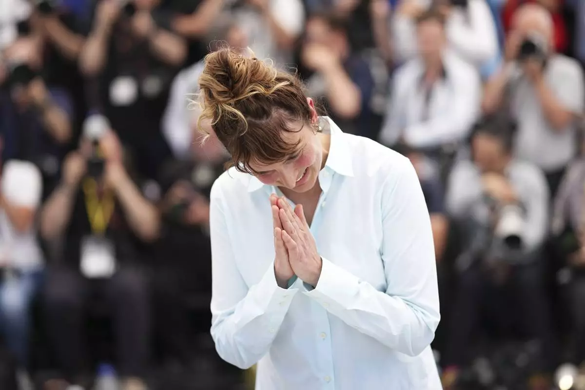 Jury president Alice Rohrwacher poses for photographers at the photo call for the Camera d'Or jury at the 78th international film festival, Cannes, southern France, Wednesday, May 14, 2025. (Photo by Scott A Garfitt/Invision/AP)