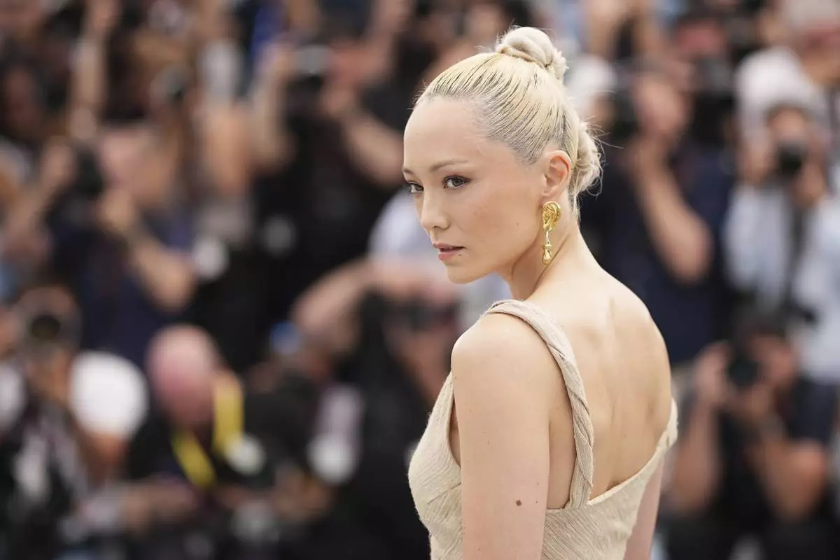 Pom Klementieff poses for photographers during the photo call for the film 'Mission: Impossible – The Final Reckoning' at the 78th international film festival, Cannes, southern France, Wednesday, May 14, 2025. (Photo by Scott A Garfitt/Invision/AP)
