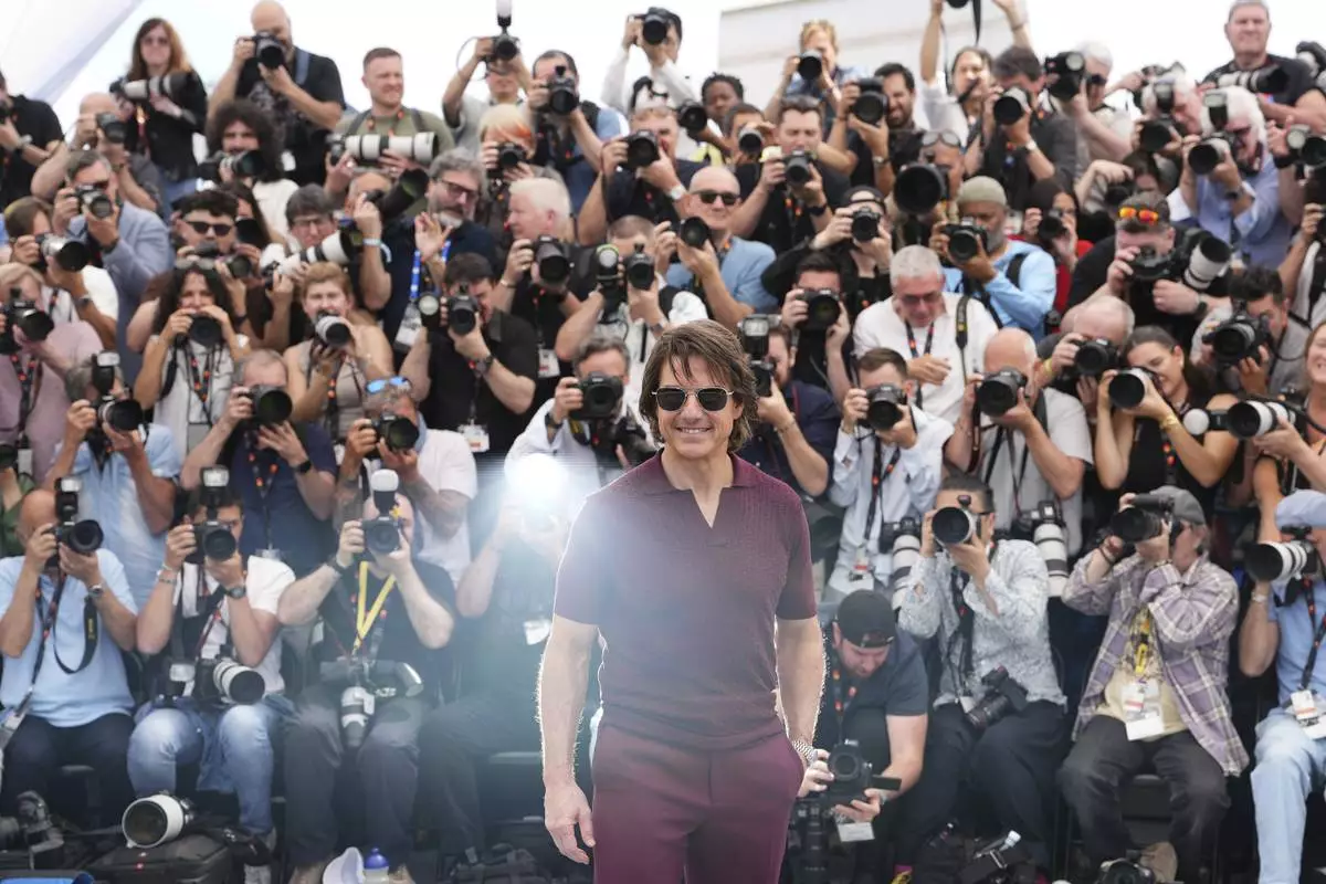 Tom Cruise poses for photographers during the photo call for the film 'Mission: Impossible – The Final Reckoning' at the 78th international film festival, Cannes, southern France, Wednesday, May 14, 2025. (Photo by Scott A Garfitt/Invision/AP)