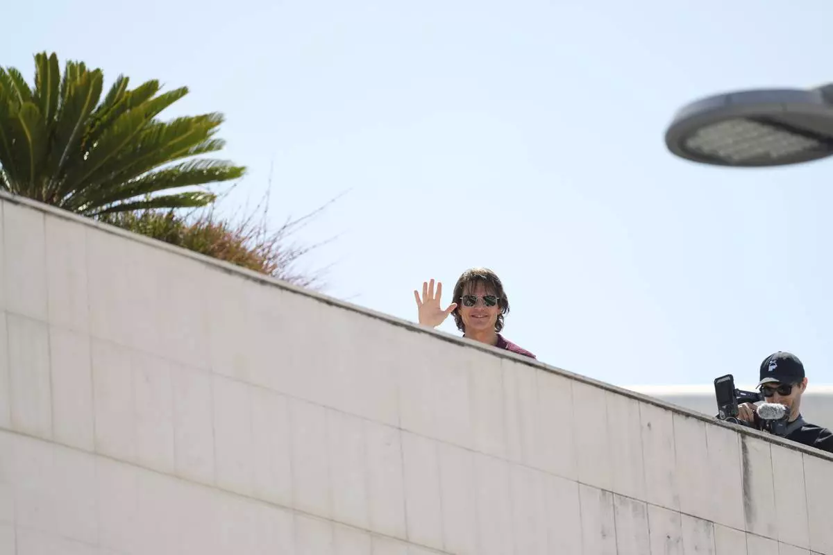 Tom Cruise arrives for the photo call for the film 'Mission: Impossible – The Final Reckoning' at the 78th international film festival, Cannes, southern France, Wednesday, May 14, 2025. (AP Photo/Natacha Pisarenko)
