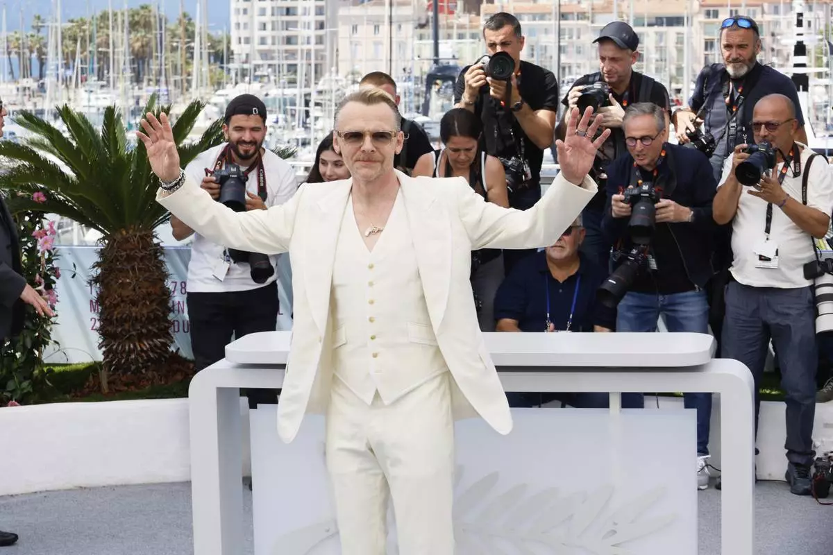 Simon Pegg poses for photographers during the photo call for the film 'Mission: Impossible – The Final Reckoning' at the 78th international film festival, Cannes, southern France, Wednesday, May 14, 2025. (Photo by Joel C Ryan/Invision/AP)