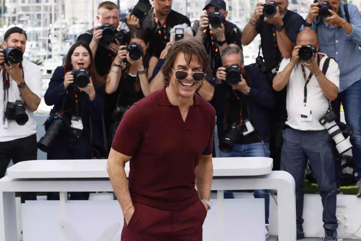 Tom Cruise poses for photographers during the photo call for the film 'Mission: Impossible – The Final Reckoning' at the 78th international film festival, Cannes, southern France, Wednesday, May 14, 2025. (Photo by Joel C Ryan/Invision/AP)