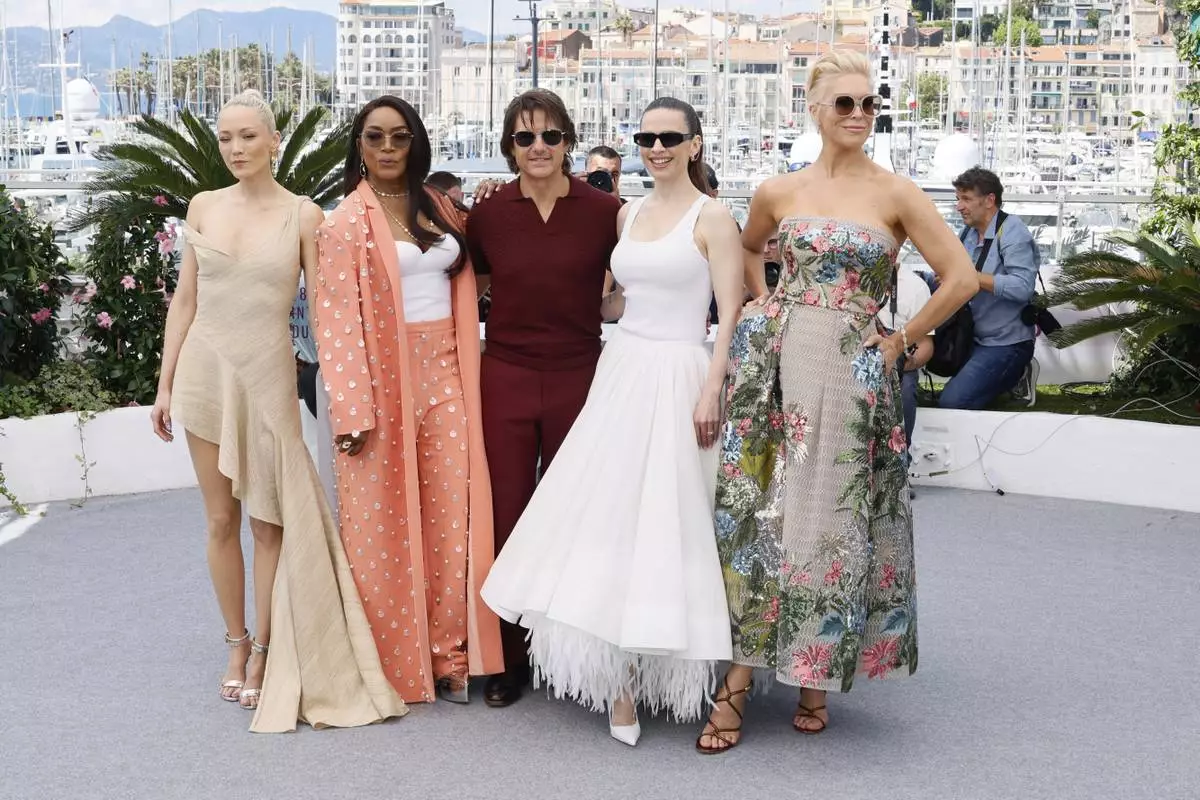 Pom Klementieff, from left, Angela Bassett, Tom Cruise, Hayley Atwell, and Hannah Waddingham pose for photographers during the photo call for the film 'Mission: Impossible – The Final Reckoning' at the 78th international film festival, Cannes, southern France, Wednesday, May 14, 2025. (Photo by Joel C Ryan/Invision/AP)