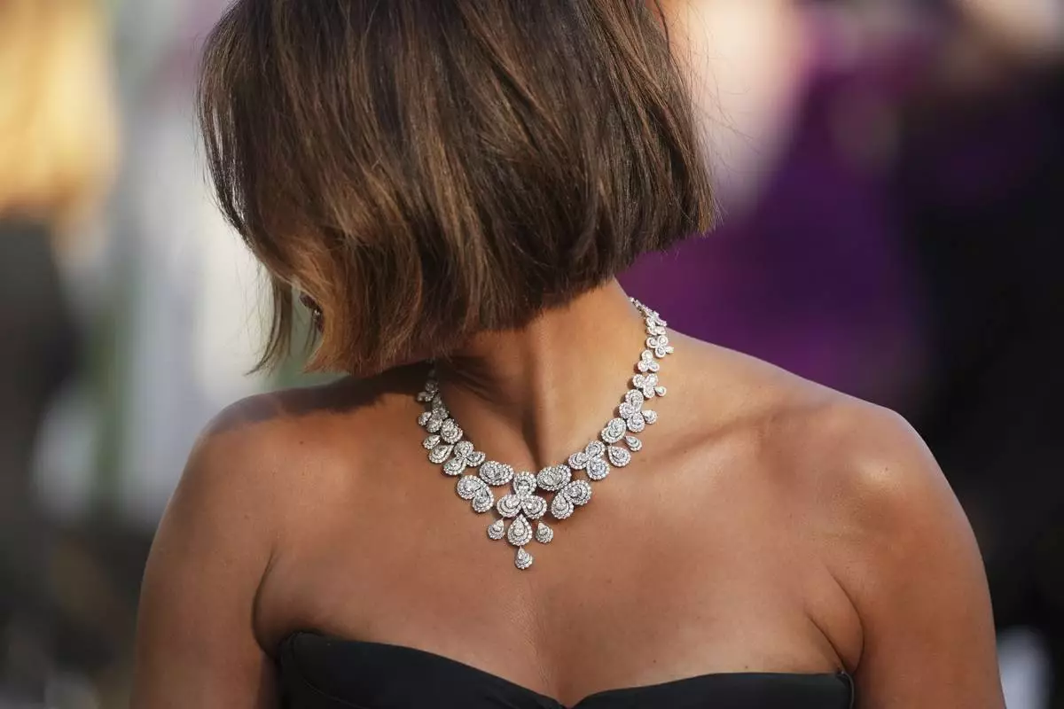 Halle Berry poses for photographers upon arrival at the premiere of the film 'Mission: Impossible - The Final Reckoning' at the 78th international film festival, Cannes, southern France, Wednesday, May 14, 2025. (Photo by Lewis Joly/Invision/AP)