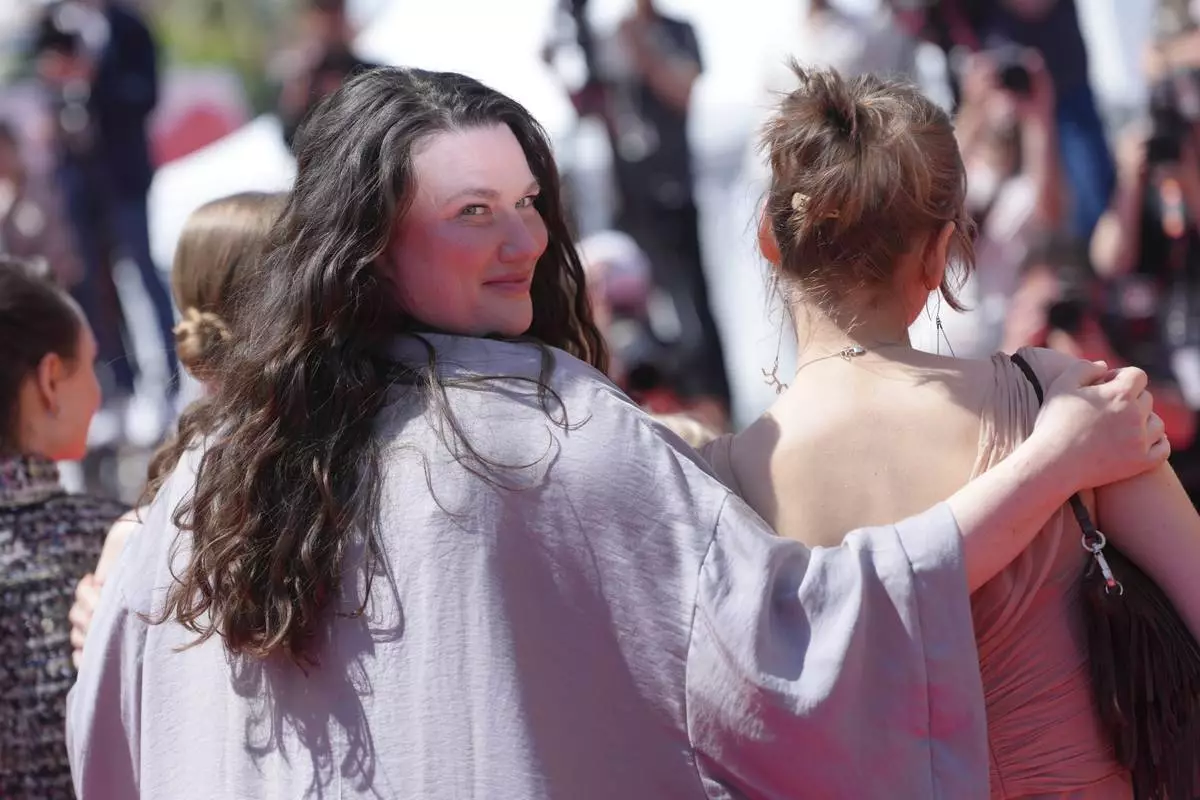Director Mascha Schilinski poses for photographers upon arrival at the premiere of the film 'Sound of Falling' at the 78th international film festival, Cannes, southern France, Wednesday, May 14, 2025. (Photo by Lewis Joly/Invision/AP)