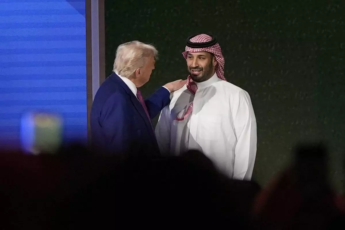 President Donald Trump shakes hands with Saudi Crown Prince Mohammed bin Salman after his speech at the King Abdulaziz International Conference Center in Riyadh, Saudi Arabia, Tuesday, May 13, 2025. (AP Photo/Alex Brandon)