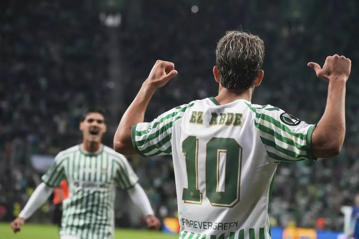 Betis' Abde Ezzalzouli celebrates after scoring his side's opening goal during the Europa Conference League final soccer match between Real Betis and Chelsea in Wroclaw, Poland, Wednesday, May 28, 2025. (AP Photo/Czarek Sokolowski)