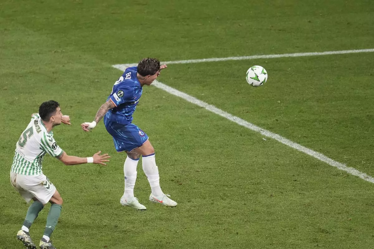 Chelsea's Enzo Fernandez scores his side's opening goal during the Europa Conference League final soccer match between Real Betis and Chelsea in Wroclaw, Poland, Wednesday, May 28, 2025. (AP Photo/Darko Vojinovic)