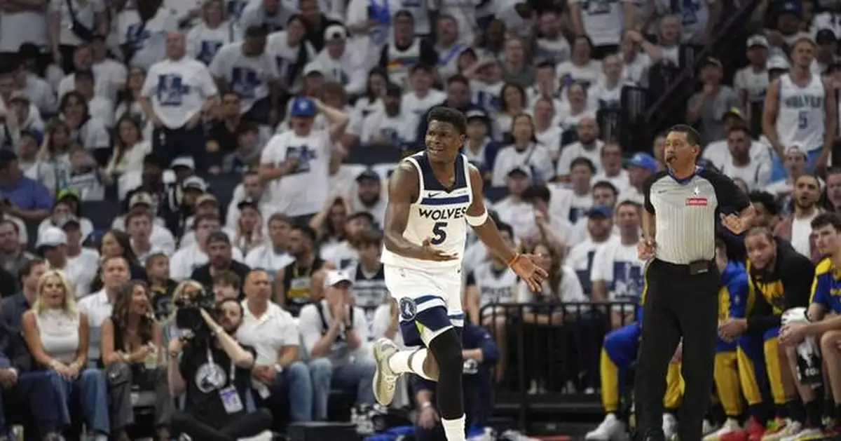 Warriors take Game 1 from cold-shooting Wolves 99-88 despite Curry's departure with hamstring strain