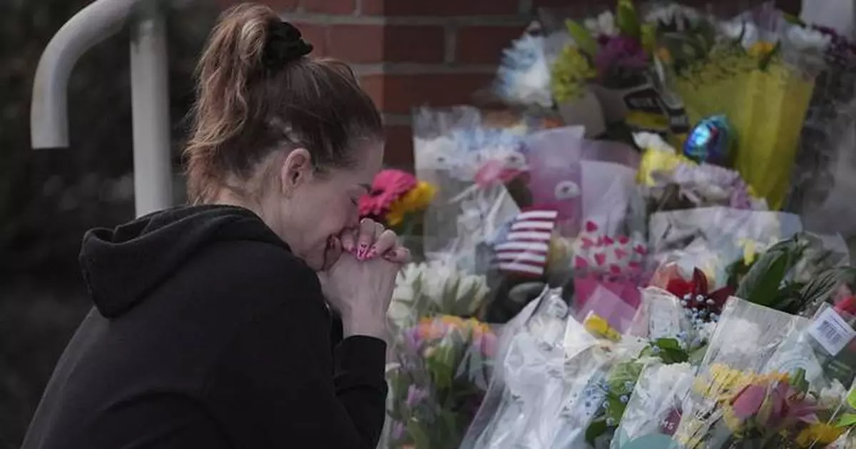 Officer killed in gunman's Pennsylvania hospital siege was felled by police fire, prosecutor says