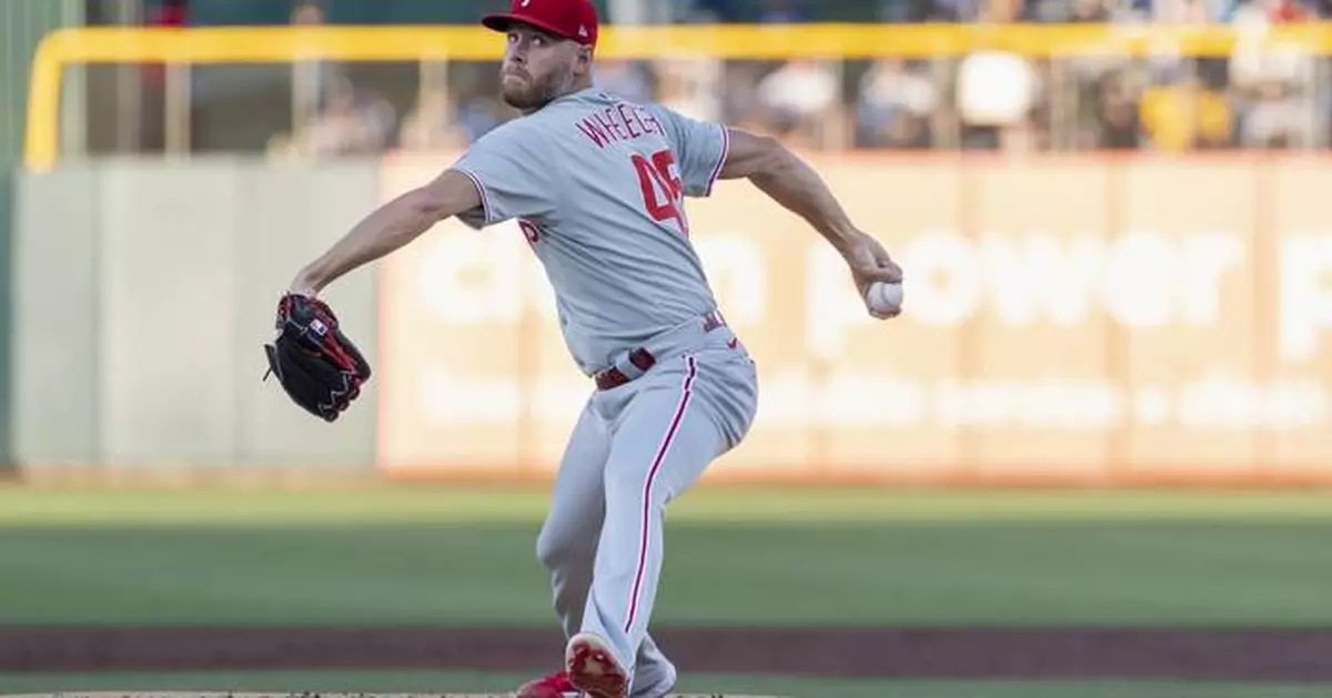 Turner homers, Wheeler strong again and Phillies beat Athletics 4-3 for 8th straight win