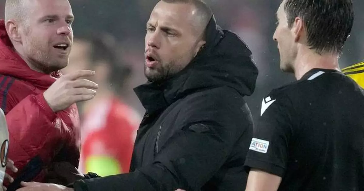 Ajax hires Liverpool assistant John Heitinga as new head coach