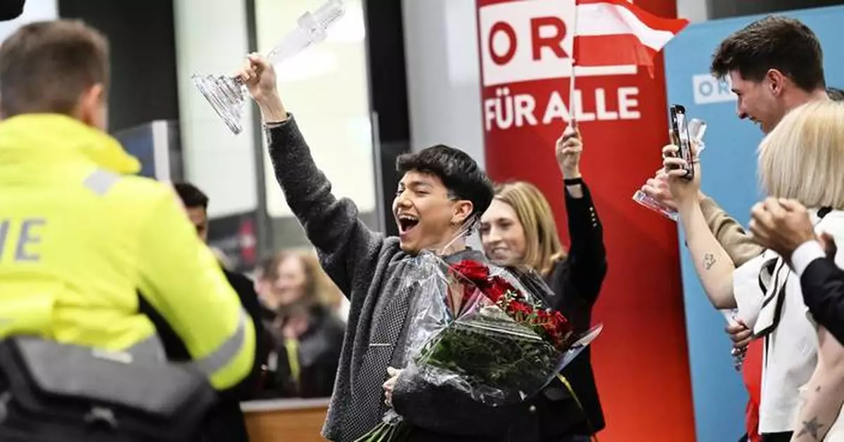 AP PHOTOS: Austria welcomes JJ back home after winning Eurovision Song Contest