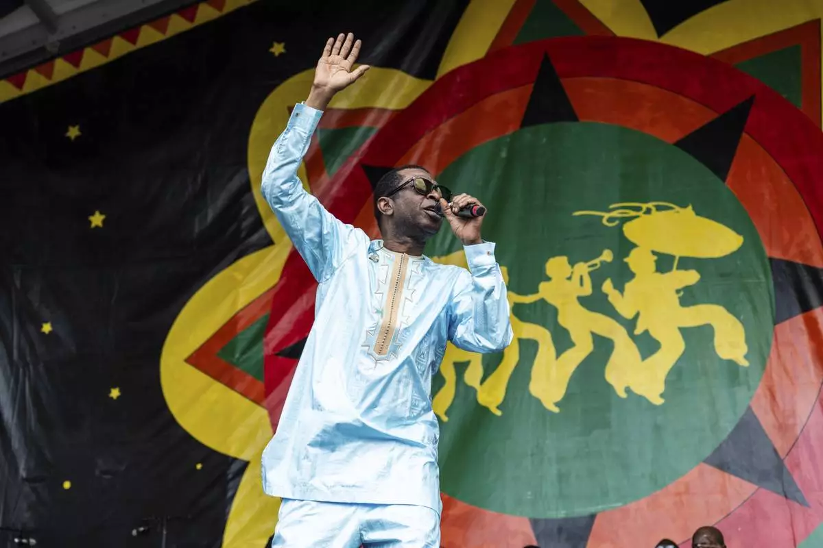 Youssou N'Dour performs during the first weekend of the New Orleans Jazz &amp; Heritage Festival on Friday, April 25, 2025, at Fair Grounds Race Course in New Orleans. (Photo by Amy Harris/Invision/AP)