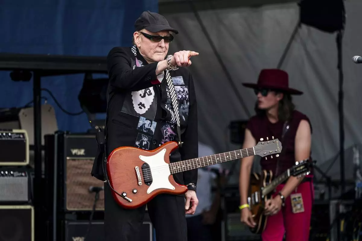 Rick Nielsen of Cheap Trick performs during the first weekend of the New Orleans Jazz &amp; Heritage Festival on Friday, April 25, 2025, at Fair Grounds Race Course in New Orleans. (Photo by Amy Harris/Invision/AP)