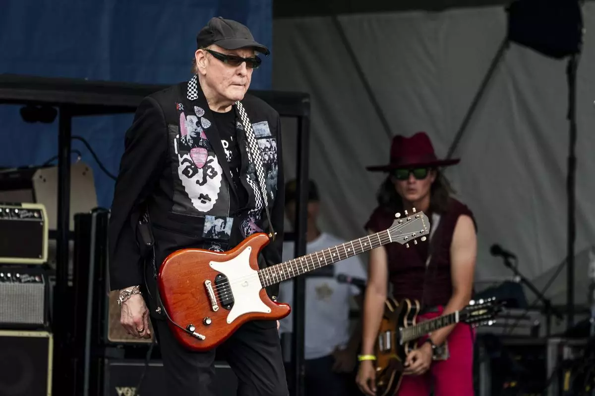 Rick Nielsen of Cheap Trick performs during the first weekend of the New Orleans Jazz &amp; Heritage Festival on Friday, April 25, 2025, at Fair Grounds Race Course in New Orleans. (Photo by Amy Harris/Invision/AP)