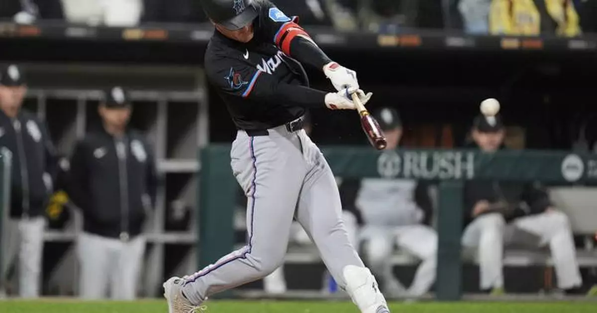 Wagaman breaks tie in 8th with 2-run triple to lift Marlins over White Sox 3-1