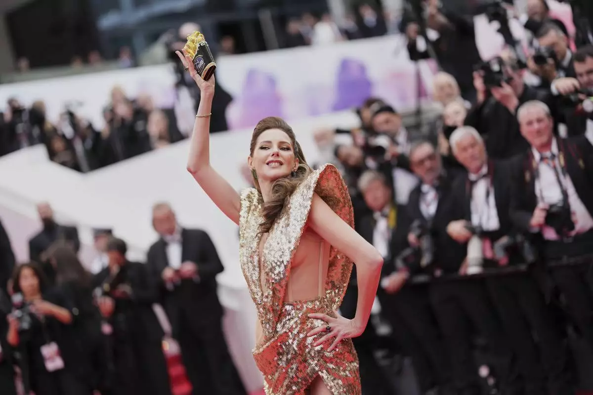 Frederique Bel poses for photographers during the opening ceremony red carpet of the 78th international film festival, Cannes, southern France, Tuesday, May 13, 2025. (Photo by Scott A Garfitt/Invision/AP)