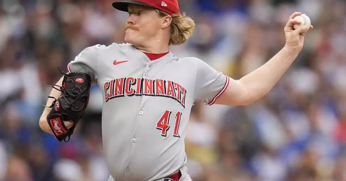 Abbott pitches 7 crisp innings as the Reds hold off the Cubs for a 6-2 win