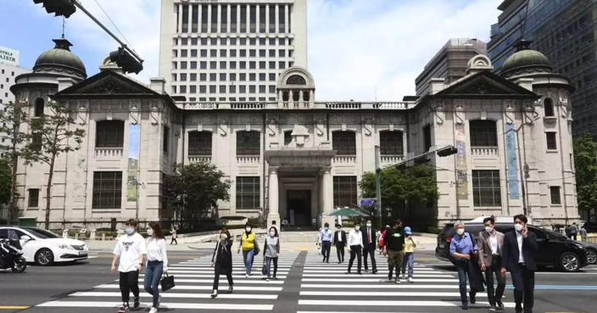 South Korea's central bank cuts borrowing costs to nurse the sluggish economy